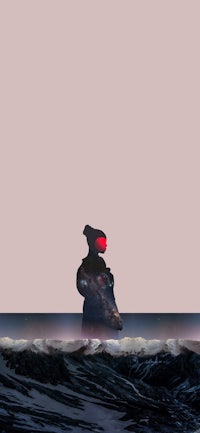 a man standing on top of a wave in the ocean